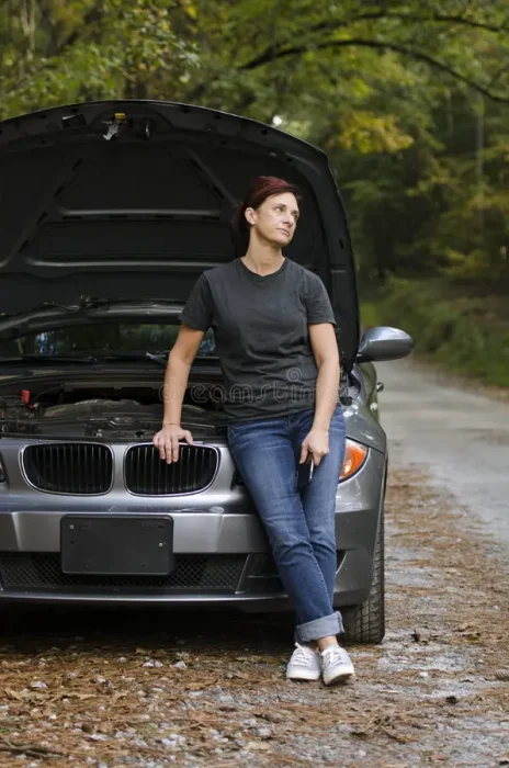 stranded-frustrated-woman-stuck-side-road-61867364